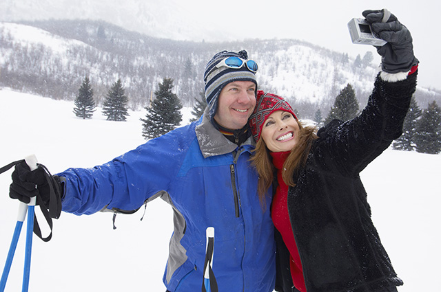 Skiing Couple Posing for Photo